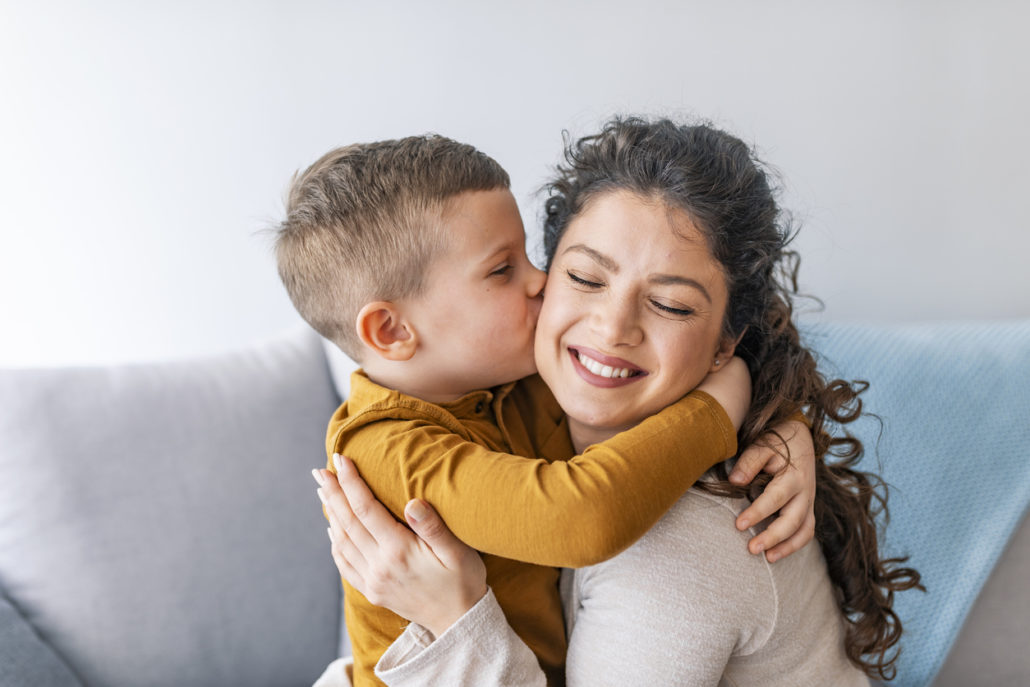 Son is kissing his foster parent. questions